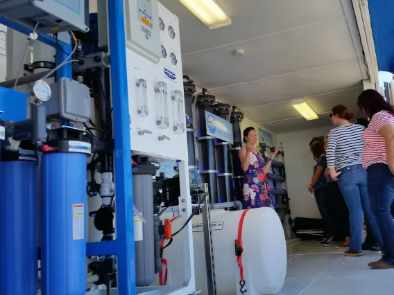 Photo of people attending a tour of the WEST Center facility