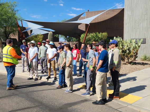 Group beginning an outdoor tour of a water reclamation facility