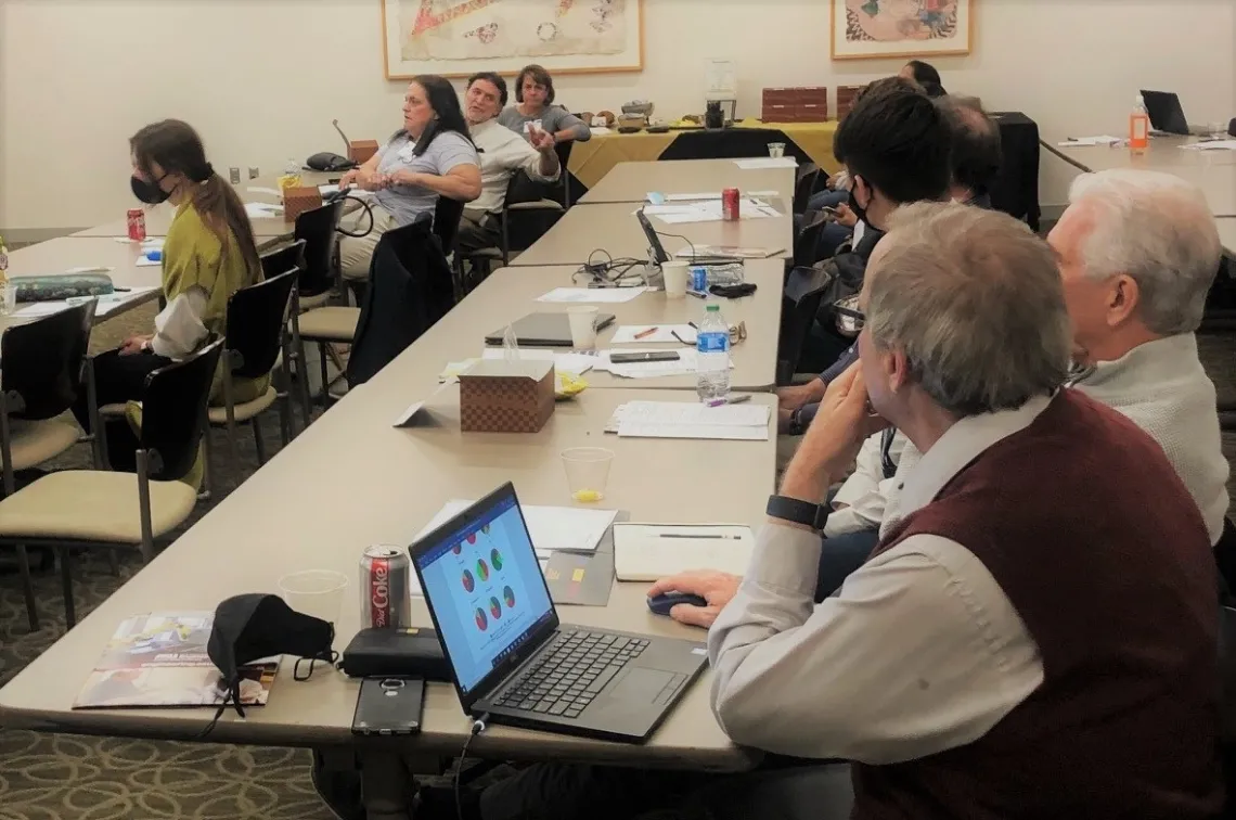 Researchers meeting in a conference room