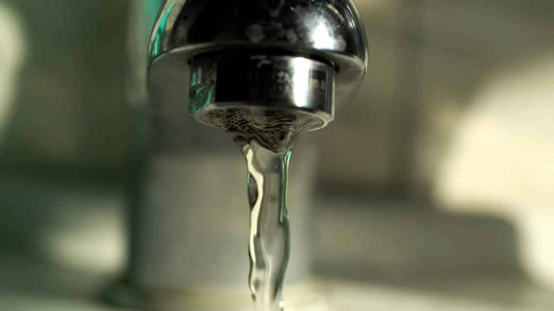 Water faucet with water coming out