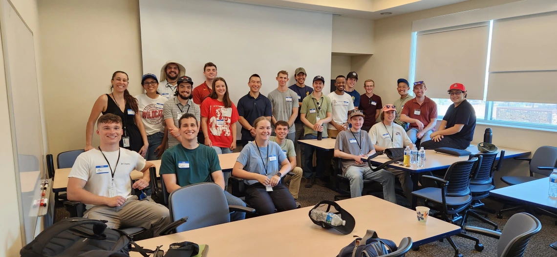 West Point cadets and instructors in WEST Center conference room