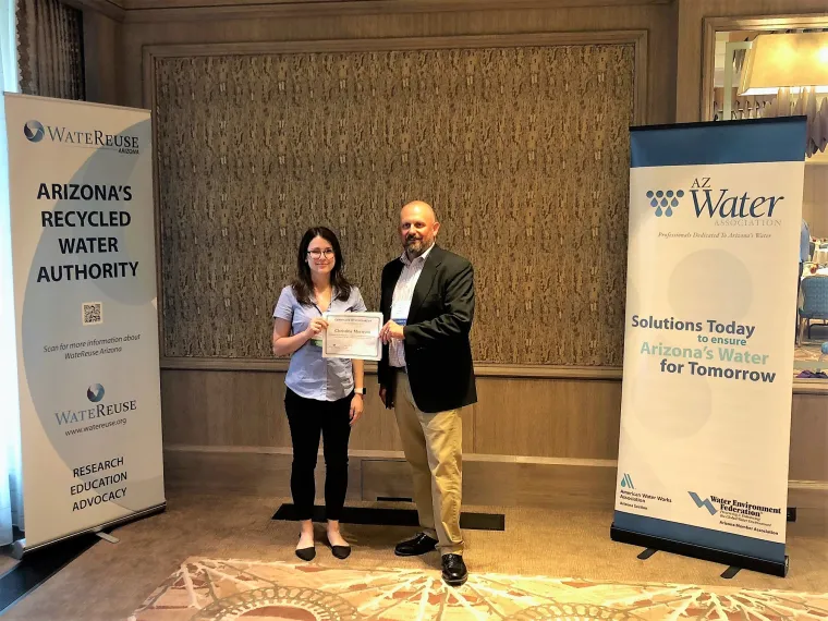 Christina Morrison receives scholarship from President of WateReuse AZ, John Kmiec.