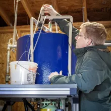 Jeb Shingler works on water experiment