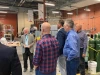 A group of people in a high bay laboratory