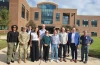 Group of people in front of a research building in Mississippi