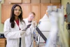 Laboratory workers with experimental instruments